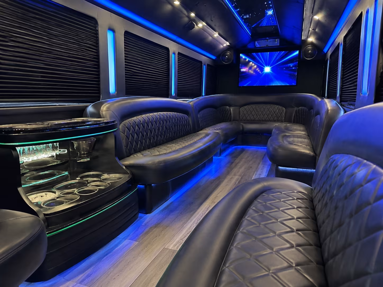 Wedding guests seated inside a party bus serving Roseville
